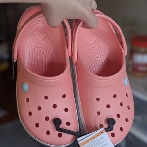 Blue and peach pink crocs